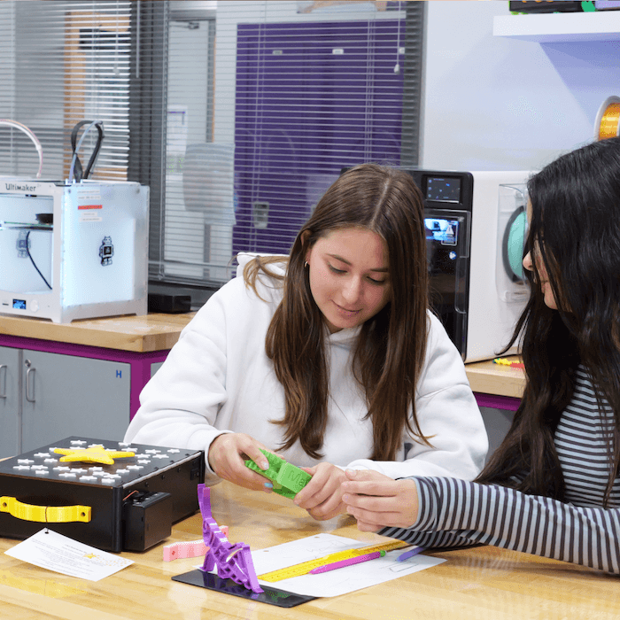 Ma'ayanot Yeshiva High School students working in the STEAM makerspace with MakerBot 3D printers