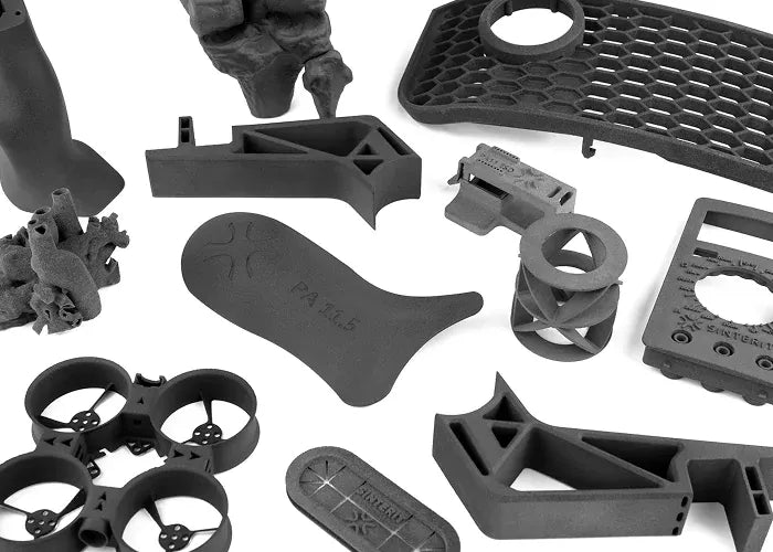 SLS 3D printing applications across manufacturing including tooling, jigs, spare parts, and fixtures produced on a Sinterit printer