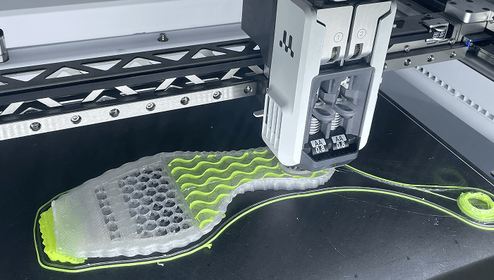 <div class="metafield-rich_text_field"><p>"FDM allows for affordable production and better sustainability compared to powder or resin-based methods, especially for flexible items. Our materials can be fully recycled or compostable, which is important for us… Thanks to its multi-material printing option for flexible materials, we can print an entire shoe using the Factor 4… We’ve always valued how easy UltiMaker is to use - especially how effortlessly the print core can be changed. Another reason we want to keep working with UltiMaker is Digital Factory. The software integrates seamlessly with our workflow.”</p></div>